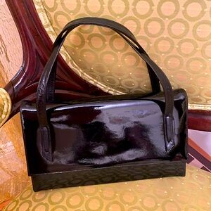 Vintage. Black formal lacquered bag with red interior